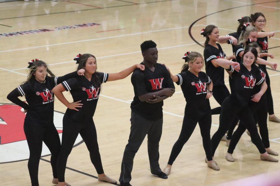 The finishes their performance at the Homecoming pep rally.