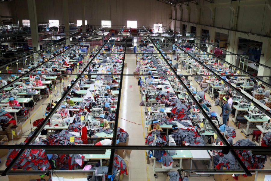 Workers+mass+produce+clothing+at+a+factory+in+Cambodia.+The+business+is+part+of+the+Better+Factories+Cambodia%2C+an+International+%0ALabour+Organization+initiative%2C+which+aims+to+improve+working+conditions+in+export+garment+factories.+%0A%28Photo%3A+Creative+Commons+-+ILO+Asia-Pacific%29