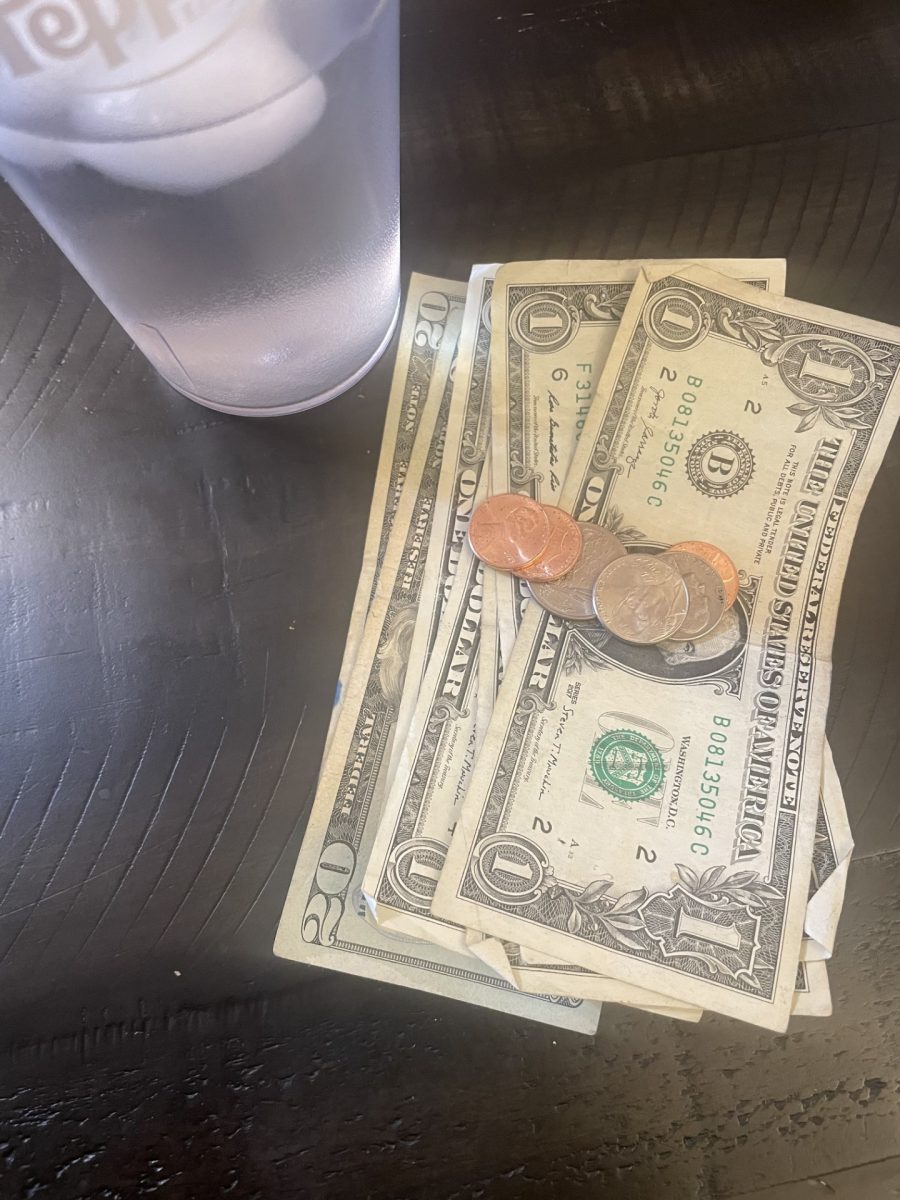 Tip left on a table after eating at a restaurant.