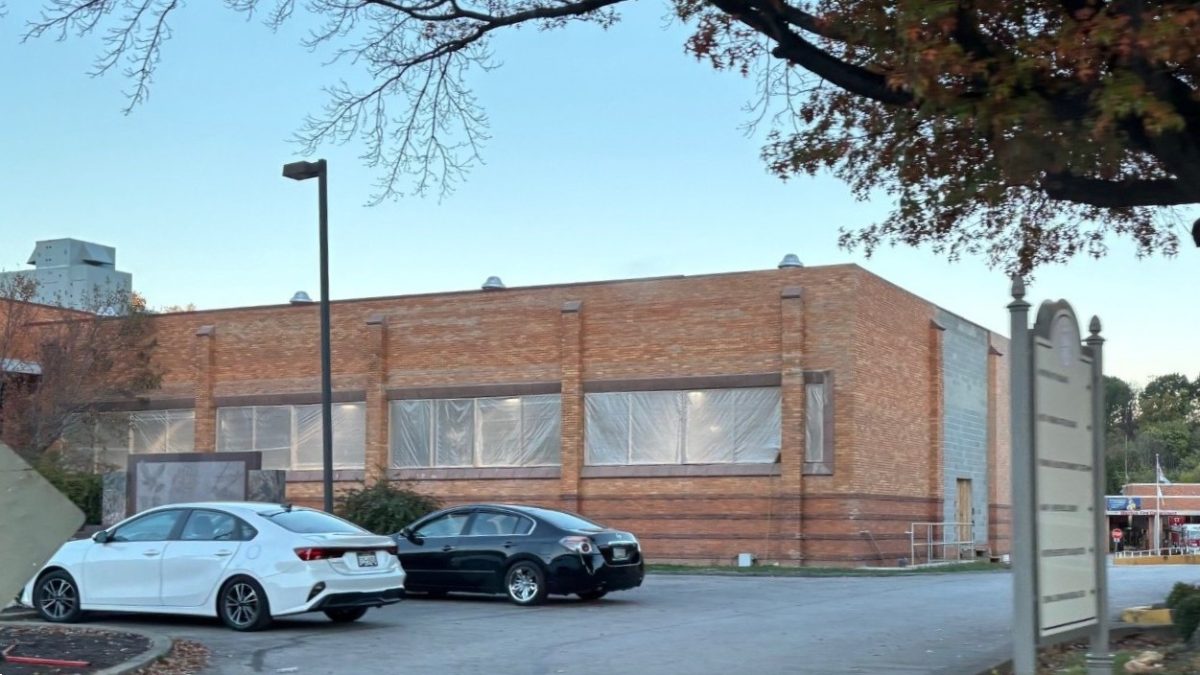 Street view of west and south wall of the pool room at the Millsop Community Center