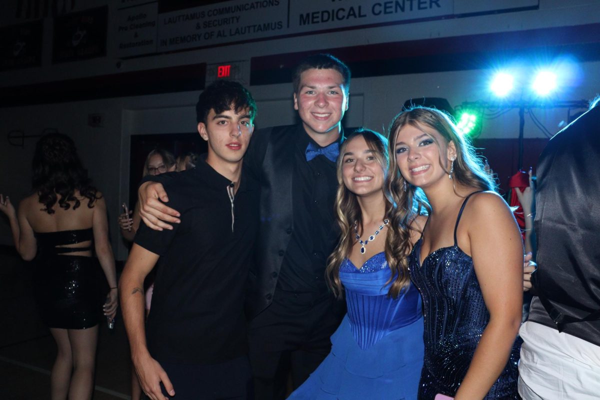 Samuel Quaranta, Jake Bischof, Chelsea Devore, Marley Gaskins pose for a picture. 